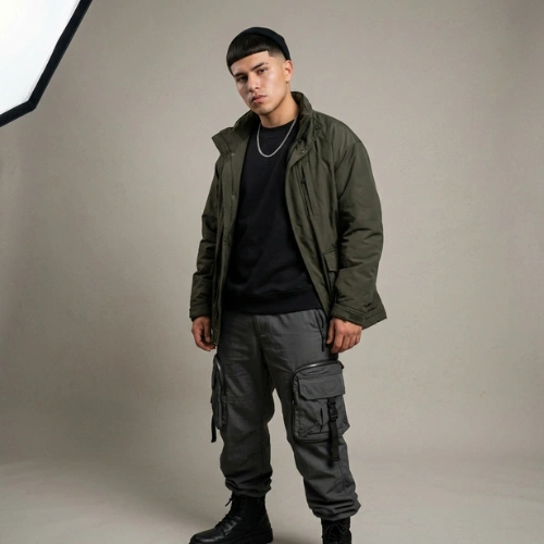 A young man wearing tactical cargo pants paired with an Edgar haircut.